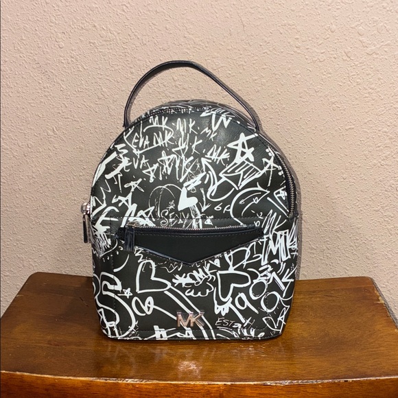 Michael Kors Handbags - Michael Kors Urban Black and White convertible Backpack/ top handbag/crossbody/